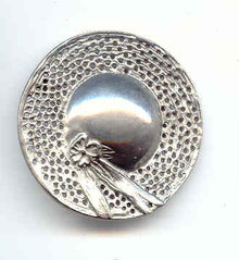 Beautiful Hat Pin looks like pewter.
