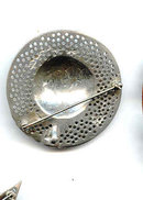 Beautiful Hat Pin looks like pewter.