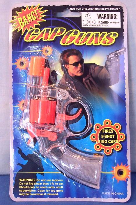 Transparent Colored Cap Gun Toy on Card