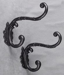 2 CAST IRON CLOTHING HOOKS