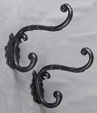 2 CAST IRON CLOTHING HOOKS