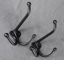 2 BLACK CAST IRON CLOTHING HOOKS