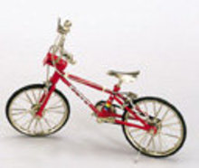 RED TOY BICYCLE / BIKE / MOTION TOYS DOLL