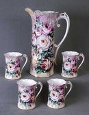 FLORAL PORCELAIN PITCHER W FOUR CUPS / NEW