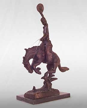 BRONCO BUSTING COWBOY STATUE / NEW