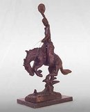BRONCO BUSTING COWBOY STATUE / NEW