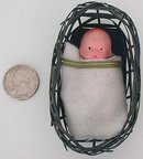 VINTAGE BISQUE BABY DOLL IN BASKET TOY JAPAN