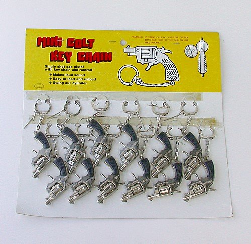 Colt Pistol Keychains on Display Card