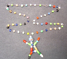 Glass Stick Figure Necklace Carnival Toy
