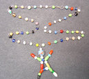 Glass Stick Figure Necklace Carnival Toy