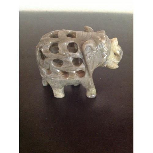 A Very Uniquely Carved Green Jade Large Elephant Figure