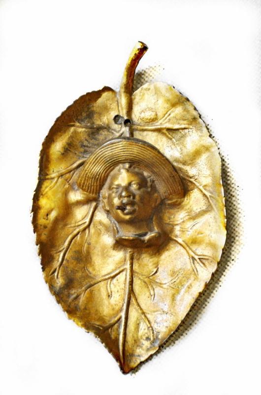 19th Century Black Ameriana Smoking Johnny Griffin Tobacco Leaf Bronze Wall Plaque