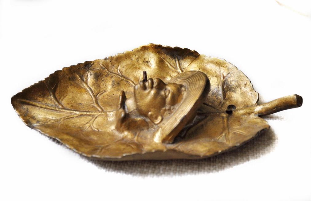 19th Century Black Ameriana Smoking Johnny Griffin Tobacco Leaf Bronze Wall Plaque