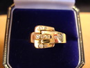 Sweet Diamond and 14Kt Yellow Gold Buckle Ring