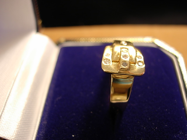 Sweet Diamond and 14Kt Yellow Gold Buckle Ring
