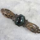 Ornate Pin Green Glass Cabochon Antiqued Oxidation