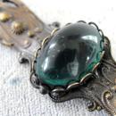 Ornate Pin Green Glass Cabochon Antiqued Oxidation