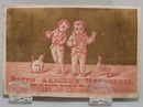 Victorian Trade Card Two Boys Dutch Arnold's Menagerie 1800's.