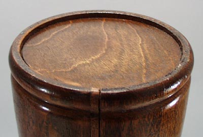 Wooden bucket with stonewear inside