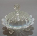 3 footed white opalescent candy bowl and lid.