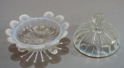3 footed white opalescent candy bowl and lid.