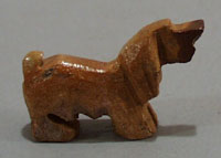 Dashound carved stone animal.