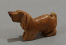 Dashound carved stone animal.