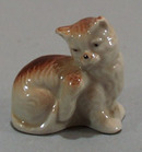 Old porcelain kitty mini figurine.