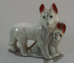 Old porcelain German Shepard dogs mini figurine