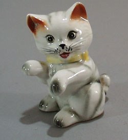 Old porcelain kitty ceramic figurine