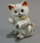 Old porcelain kitty ceramic figurine