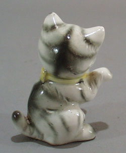 Old porcelain kitty ceramic figurine