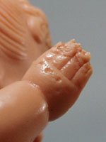 Soft squeaker rubber doll, blue skirt and shoes