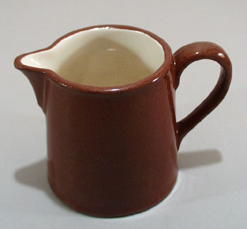 Redware old cream pitcher.