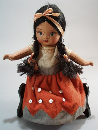 Pr of Composition dolls, larger souvineer type.