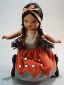Pr of Composition dolls, larger souvineer type.