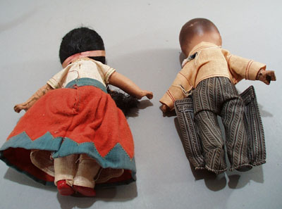 Pr of Composition dolls, larger souvineer type.