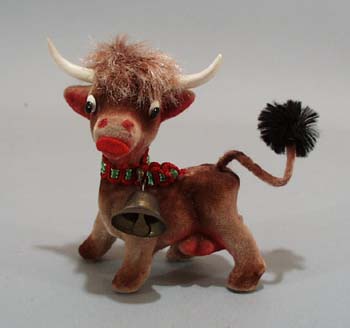 Flocked Cow with bell.