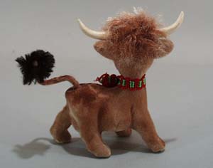 Flocked Cow with bell.