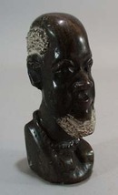 Carved stone bookend of Tribal man