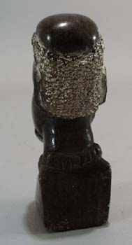 Carved stone bookend of Tribal man