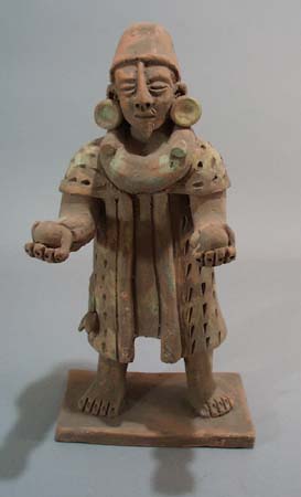 Clay Figure of man holding 2 balls