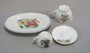 4 pc childs dishes, a platter, 2 cups and a saucer
