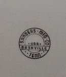 Arkansas State Plate with pink trim.