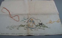 Dishtowel with dutch girl chasing geese.