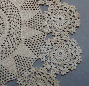 Tiny stitched crochet doily.