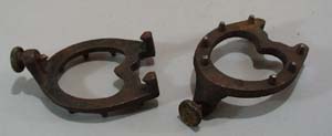 Pr of metal heel attachments.