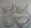 4 old Jelly jars with Crown emblem