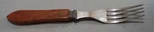 Bakelite fork with 4 tines. Stainless Steel