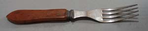 Bakelite fork with 4 tines. Stainless Steel